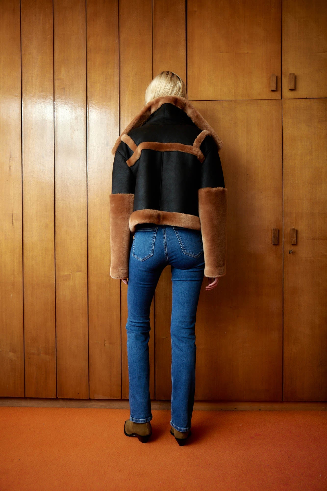 Back view of the DREJANI Aeronaut Shearling Jacket, highlighting the stylish and warm shearling material.